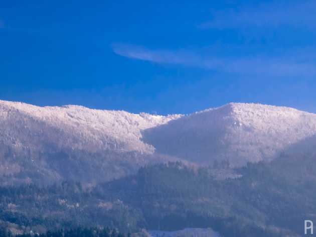 Summit of the Kandel mountain with the new mountaintop hotel under construction, January 2021.